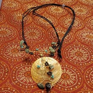 Green stone and bluish green bead necklace